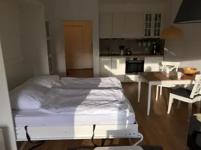 Ein Bett oder Betten in einem Zimmer der Unterkunft Central Garden-Mountain Apartment