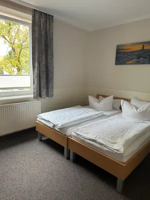 Ein Bett oder Betten in einem Zimmer der Unterkunft Gasthof Kreisi