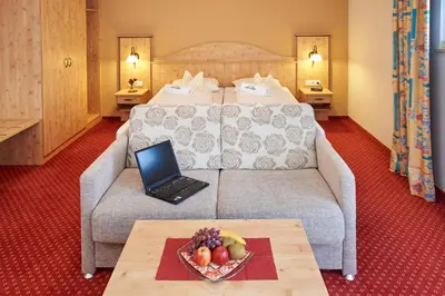 Ein Bett oder Betten in einem Zimmer der Unterkunft Apparthotel Minerva Diana Octavia