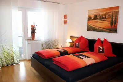 Ein Bett oder Betten in einem Zimmer der Unterkunft Ferienwohnung Geyer