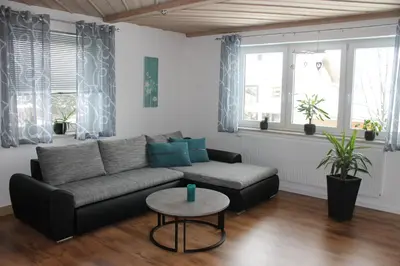 Ein Sitzbereich in der Unterkunft Ferienwohnung Geyer