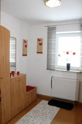 Ein Bett oder Betten in einem Zimmer der Unterkunft Ferienwohnung Geyer