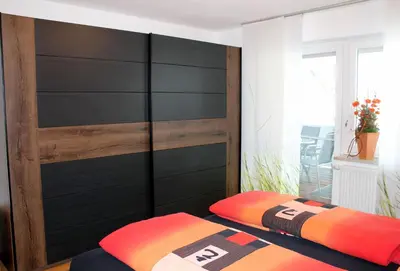 Ein Bett oder Betten in einem Zimmer der Unterkunft Ferienwohnung Geyer