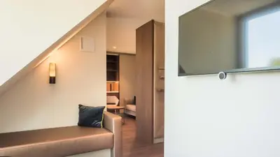Ein Sitzbereich in der Unterkunft Innspire Hotel