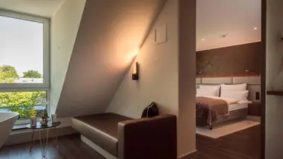Ein Bett oder Betten in einem Zimmer der Unterkunft Innspire Hotel