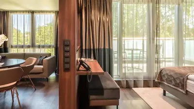 Ein Bett oder Betten in einem Zimmer der Unterkunft Innspire Hotel