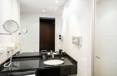 Ein Badezimmer in der Unterkunft The Rilano Munich, Trademark Collection by Wyndham
