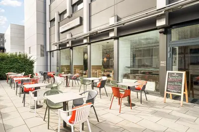 Ein Restaurant oder anderes Speiselokal in der Unterkunft The Rilano Munich, Trademark Collection by Wyndham