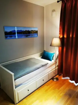 Ein Bett oder Betten in einem Zimmer der Unterkunft Top-Apartment a.d. Messe