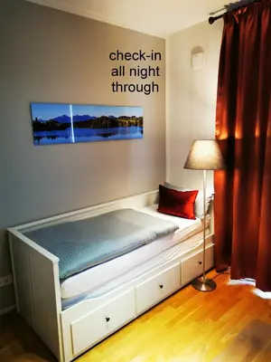 Ein Bett oder Betten in einem Zimmer der Unterkunft Top-Apartment a.d. Messe