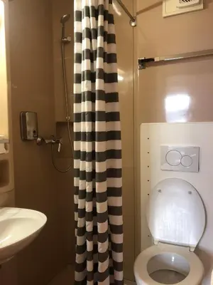 Ein Badezimmer in der Unterkunft Hotel Pension Schmellergarten