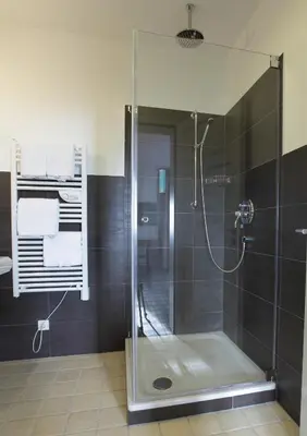 Ein Badezimmer in der Unterkunft DIE POST Landgasthof Aufkirchen