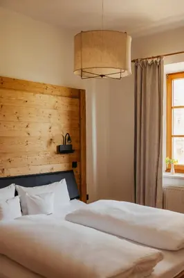 Ein Bett oder Betten in einem Zimmer der Unterkunft Staudingerhof
