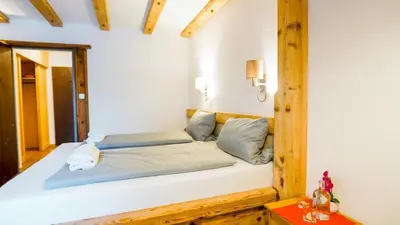 Ein Bett oder Betten in einem Zimmer der Unterkunft Landgasthof zum Papyrer - Erholung im Urlaubsgebiet