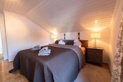 Ein Bett oder Betten in einem Zimmer der Unterkunft Bergzeit