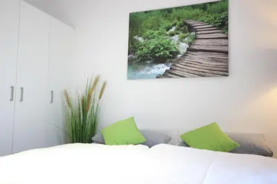 Ein Bett oder Betten in einem Zimmer der Unterkunft Aparthotel my room - Messe Munich
