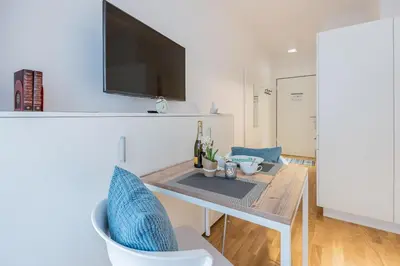 TV/Unterhaltungsangebot in der Unterkunft Serviced Apartment München-Messe/G