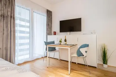 TV/Unterhaltungsangebot in der Unterkunft Serviced Apartment München-Messe/G