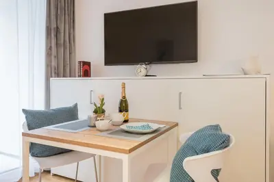 TV/Unterhaltungsangebot in der Unterkunft Serviced Apartment München-Messe/G
