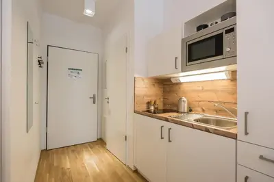 Küche/Küchenzeile in der Unterkunft Serviced Apartment München-Messe/G