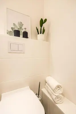 Ein Bett oder Betten in einem Zimmer der Unterkunft Serviced Apartment München-Messe/G