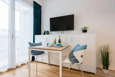 TV/Unterhaltungsangebot in der Unterkunft Serviced Apartment München-Messe/G