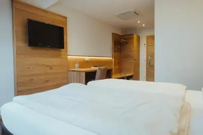 Ein Bett oder Betten in einem Zimmer der Unterkunft Hotel - Landgasthof Obermaier Zum Vilserwirt