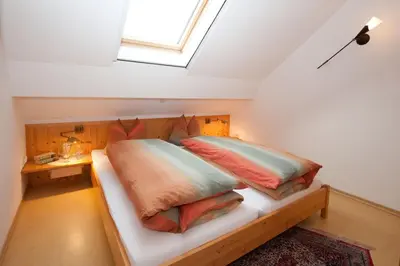Ein Bett oder Betten in einem Zimmer der Unterkunft Stadler-Hof