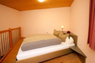 Ein Bett oder Betten in einem Zimmer der Unterkunft Stadler-Hof