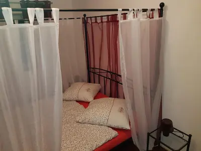 Ein Bett oder Betten in einem Zimmer der Unterkunft Romantik Ferienwohnung am Tor zum Allgäu