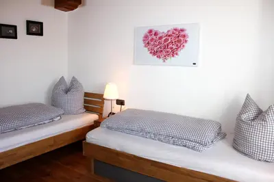 Ein Bett oder Betten in einem Zimmer der Unterkunft Ultra Alpes Luitpold