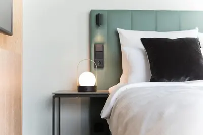 Ein Bett oder Betten in einem Zimmer der Unterkunft SOLLER Business Hotel - Munich Airport MUC