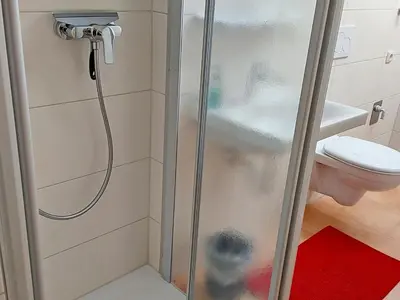 Ein Badezimmer in der Unterkunft Gästehaus Koyerbauer Boardinghouse