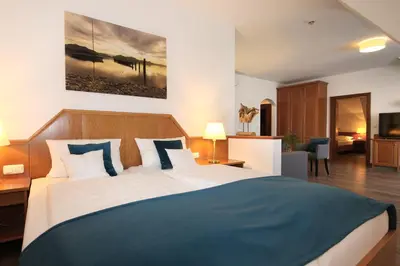 Ein Bett oder Betten in einem Zimmer der Unterkunft Gasthof zur Post Oberwirt