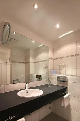 Ein Badezimmer in der Unterkunft Gasthof zur Post Oberwirt