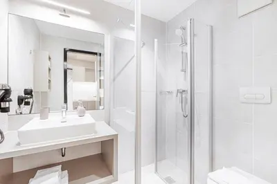 Ein Badezimmer in der Unterkunft Vonder Munich