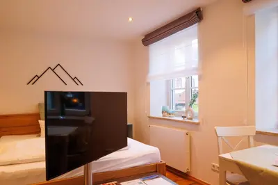 Ein Bett oder Betten in einem Zimmer der Unterkunft Bad Tölz Mittendrin