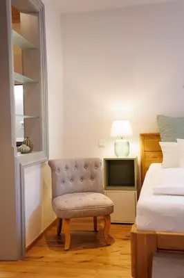 Ein Bett oder Betten in einem Zimmer der Unterkunft Bad Tölz Mittendrin