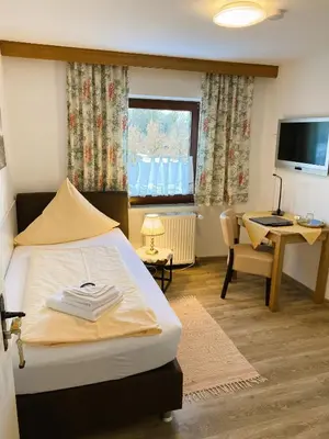 Ein Bett oder Betten in einem Zimmer der Unterkunft König Ludwig Stub´n