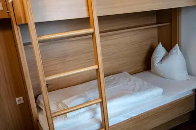 Ein Bett oder Betten in einem Zimmer der Unterkunft Ausbildungshotel St. Theresia