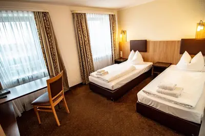 Ein Bett oder Betten in einem Zimmer der Unterkunft Ausbildungshotel St. Theresia