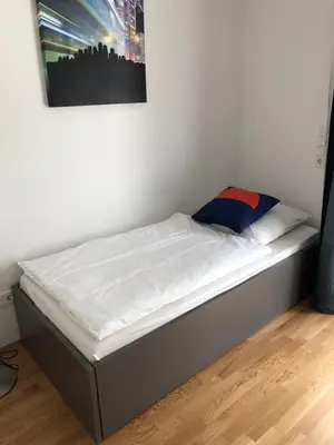 Ein Bett oder Betten in einem Zimmer der Unterkunft My room serviced apartment-Messe