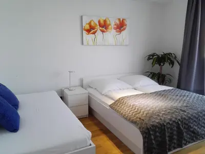 Ein Bett oder Betten in einem Zimmer der Unterkunft My room serviced apartment-Messe