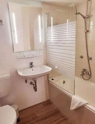 Ein Badezimmer in der Unterkunft Hotel Atlanta