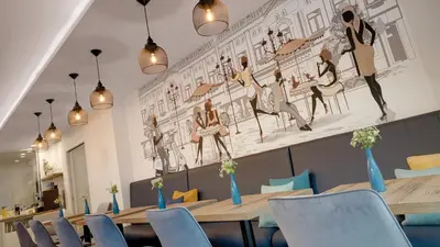 Ein Restaurant oder anderes Speiselokal in der Unterkunft Amper Art Hotel