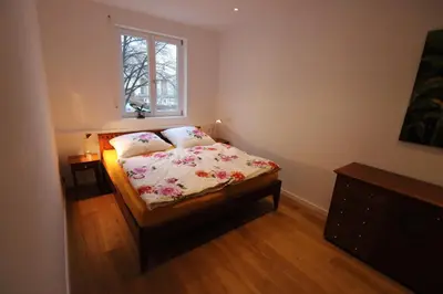 Ein Bett oder Betten in einem Zimmer der Unterkunft Fewo am Josephsplatz 125 m2