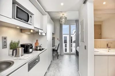 Küche/Küchenzeile in der Unterkunft H.ome Serviced Apartments München