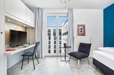 TV/Unterhaltungsangebot in der Unterkunft H.ome Serviced Apartments München