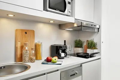 Küche/Küchenzeile in der Unterkunft H.ome Serviced Apartments München