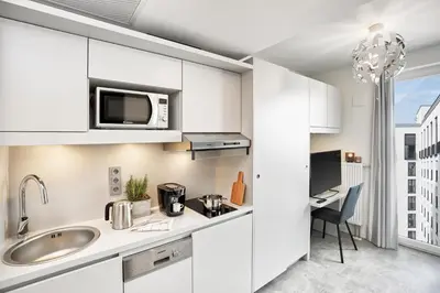 Küche/Küchenzeile in der Unterkunft H.ome Serviced Apartments München